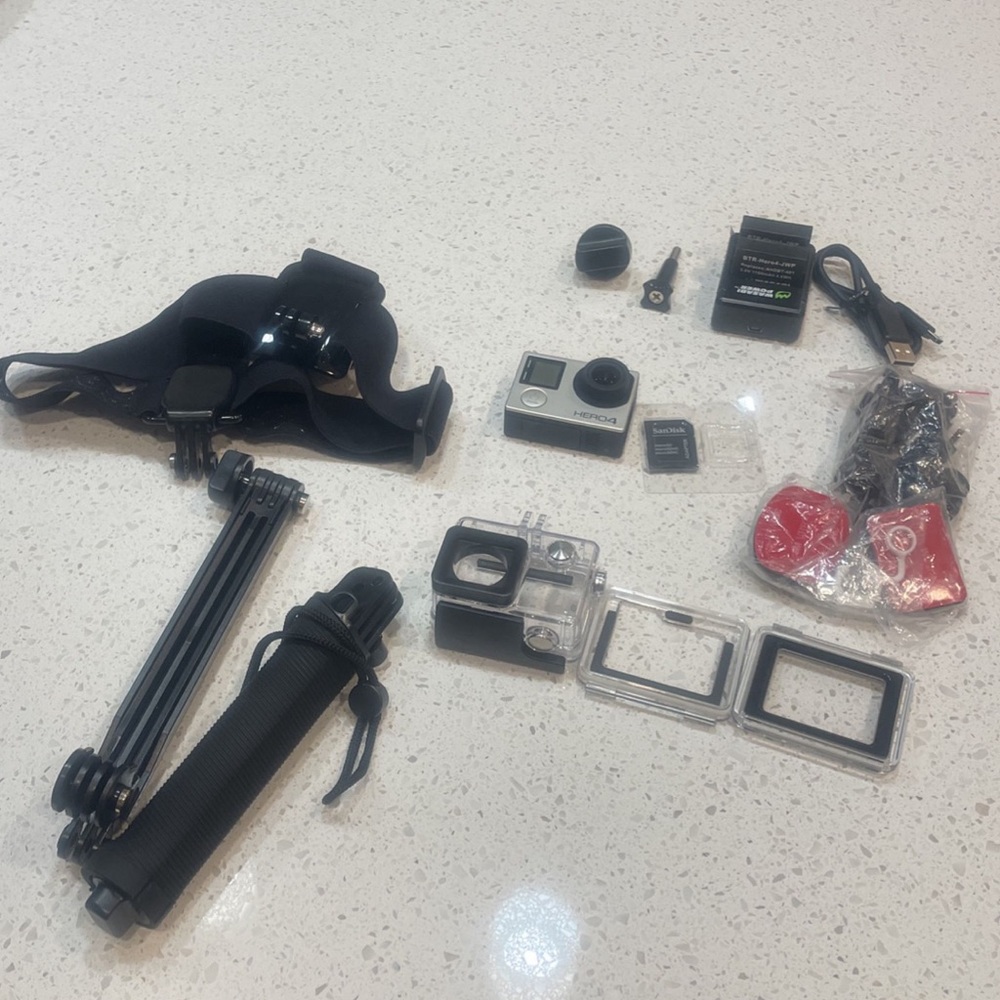 New GoPro Hero 4 Silver Bundle + Additional Accessories